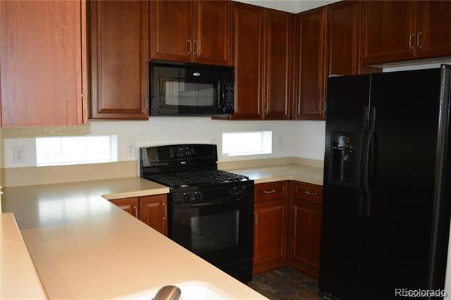 Building Photo - 8388 E 23rd Ave