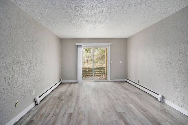 Building Photo - $1049 Renovated 2 bedroom 1 bathroom apartment with wooded views and patio