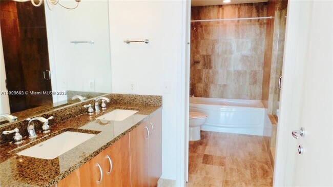 Building Photo - 300 S Biscayne Blvd