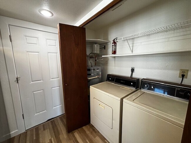 Building Photo - Spacious, two bedrooms, one bath in the Ro...