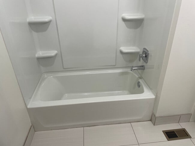 Building Photo - Spacious 3-bedroom 1.5 Bath Twin-Home with a Fenced Backyard