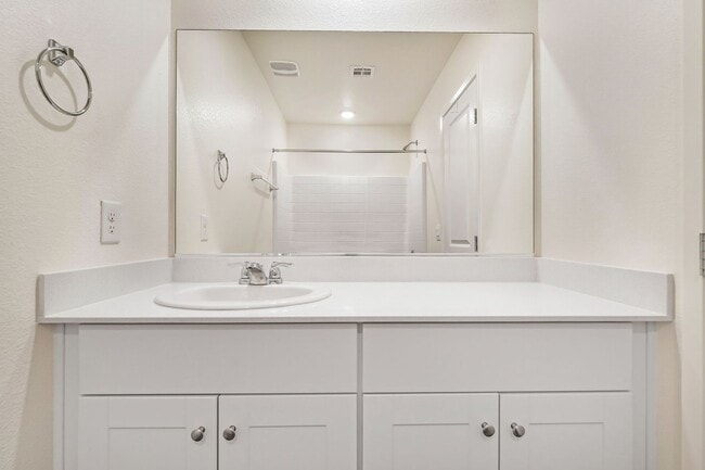 Building Photo - Modern West Henderson Townhome with Sleek Upgrades & Smart Home Features!