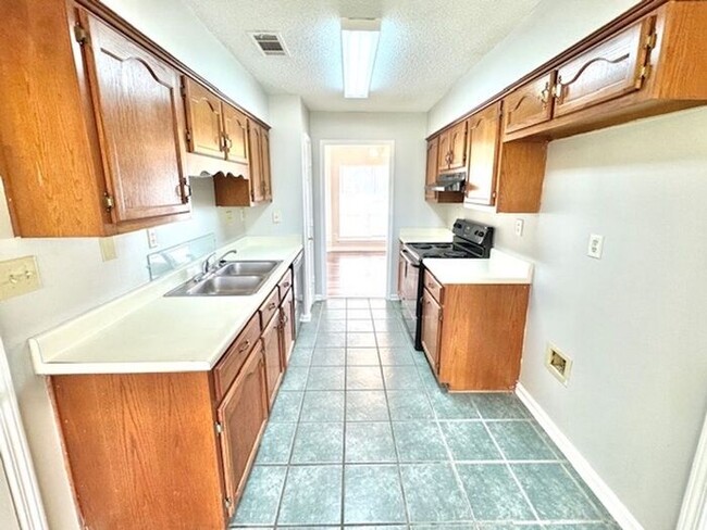 Building Photo - Available Now! Now Leasing a charming 3-be...