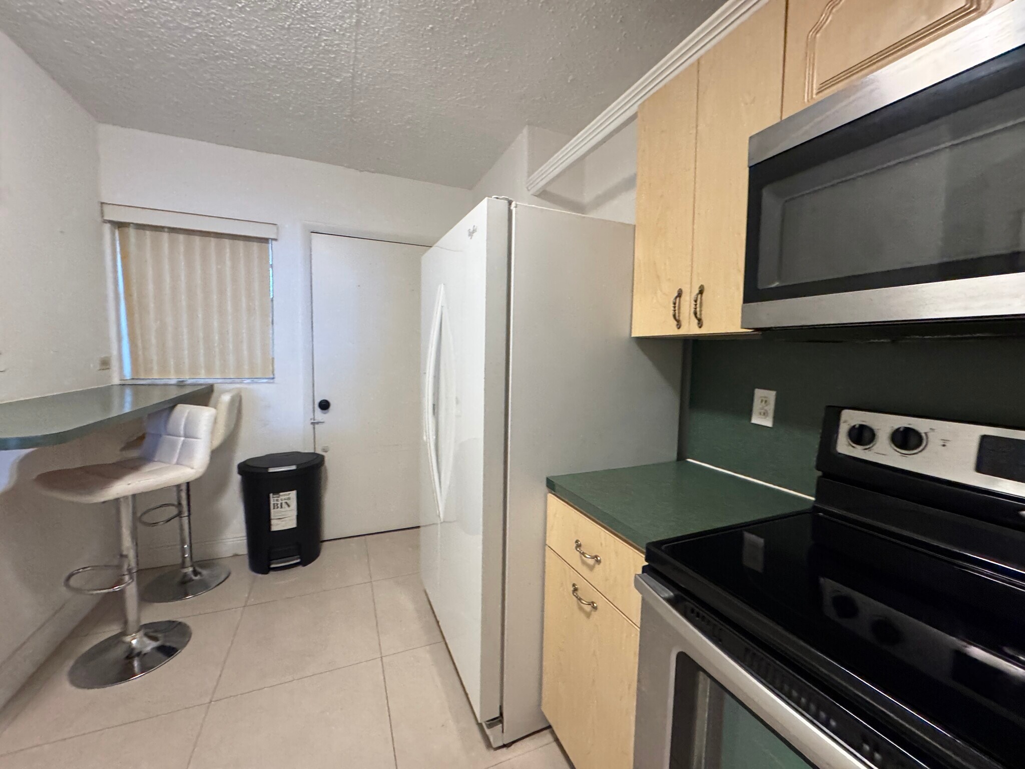 Kitchen with Breakfast Bar - 1670 NE 191st St