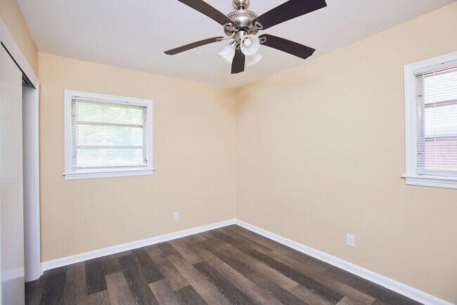 Building Photo - Vintage Charm with Modern Upgrades and Sunroom Living