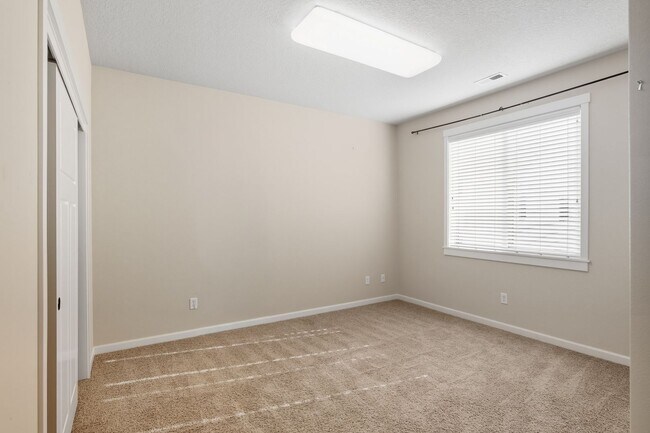 Building Photo - NEW Price - Delightful 4-Bedroom, 2.5-Bath...