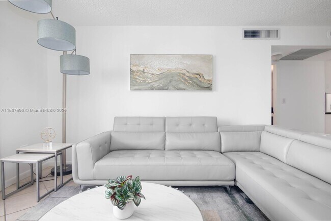Building Photo - 5555 Collins Ave