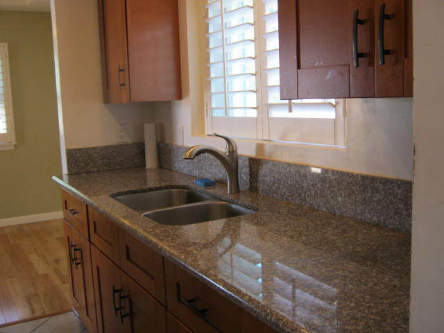 Laundry area looking at kitchen counter - 931 S Oak St