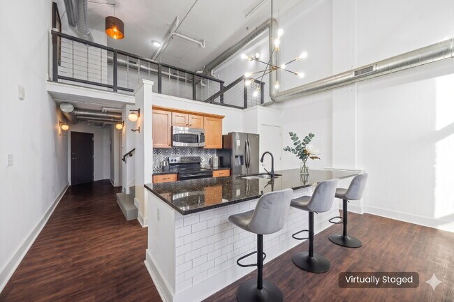 Building Photo - Urban Loft Condo Featuring Stunning Views & Rooftop Entertaining