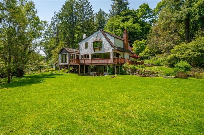Building Photo - Stunning Updated Home with Private Pond Views in Chappaqua