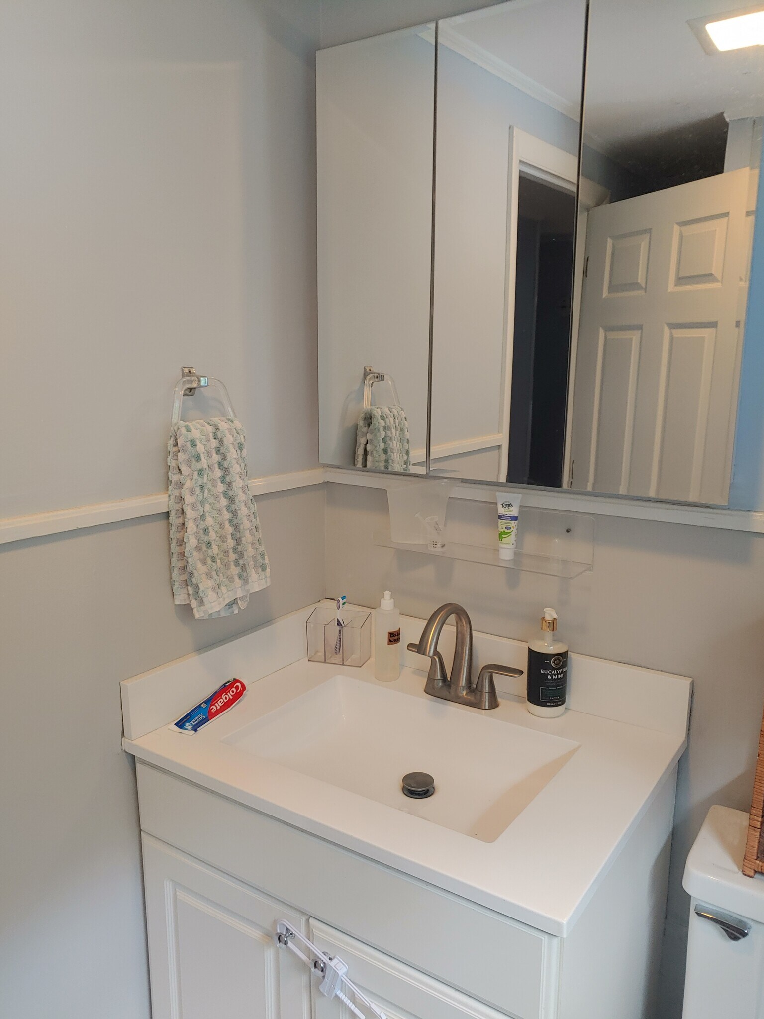 New bath vanity, sink and medicine cabinet. new tiled floor- shower only , no tub - 623 Old West Central St