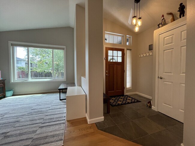 Building Photo - Spacious 3-Bedroom Home with Two Living Areas, Private Balcony, Fireplace & Attached 2-Car Garage