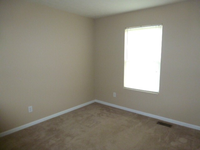 Building Photo - 1004 Wild Flower Ln