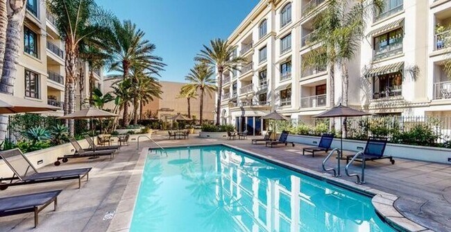 Building Photo - Experience Elevated Living at The American...