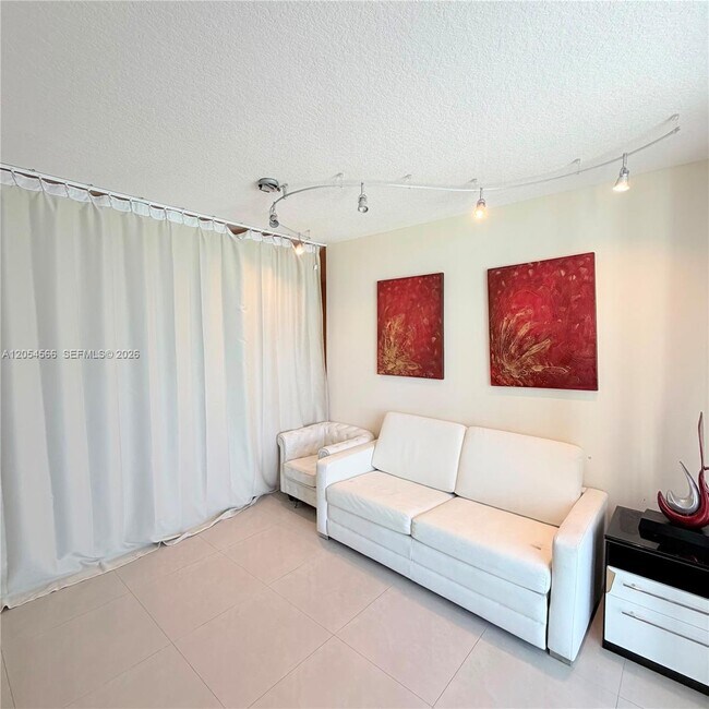 Building Photo - 16699 Collins Ave
