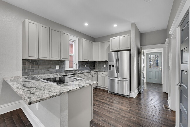 Building Photo - $3,240.95, $300 off the first month's rent, 4 Beds - 2 Bath, Single Family Home in Denver with Wa...