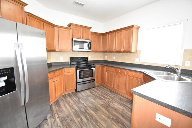 Building Photo - (Coming Soon)   4 Bedroom and 2.5 Bath Hom...