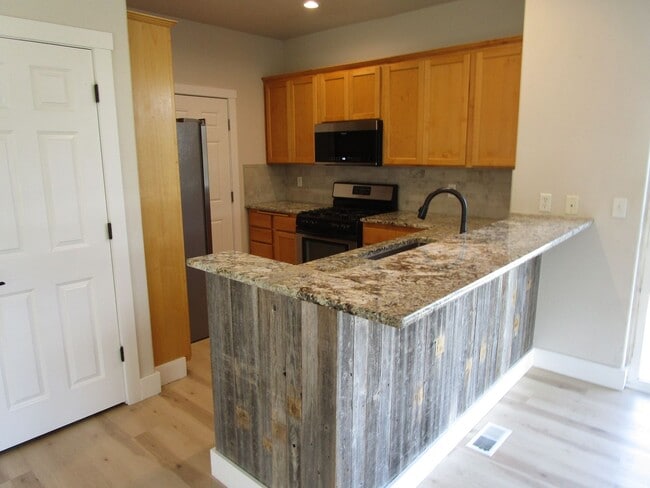 Building Photo - Completely Refreshed 2 Story Home with Fen...