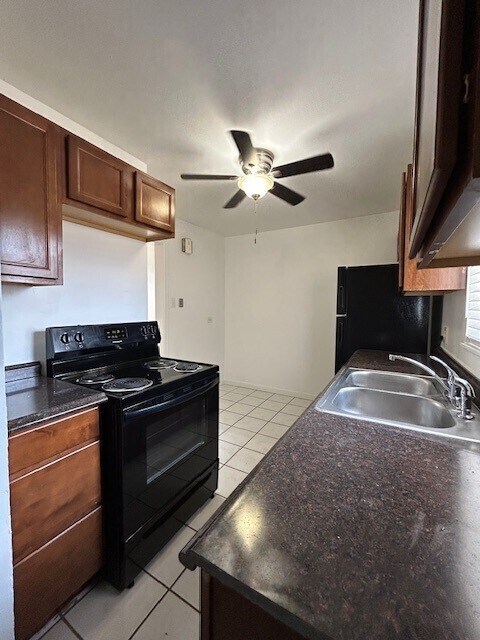 Building Photo - Available now! Spacious living room. Newly...