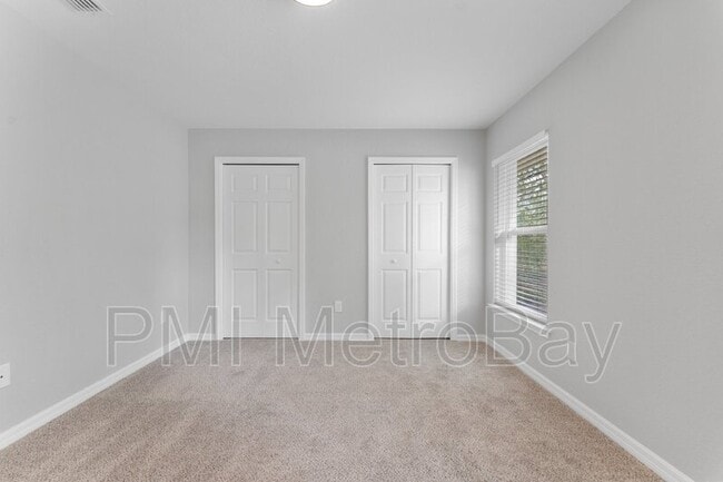 Building Photo - 9461 N Sandree Dr