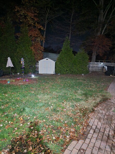 Backyard, patio and shed - 12809 E Shelby Ln