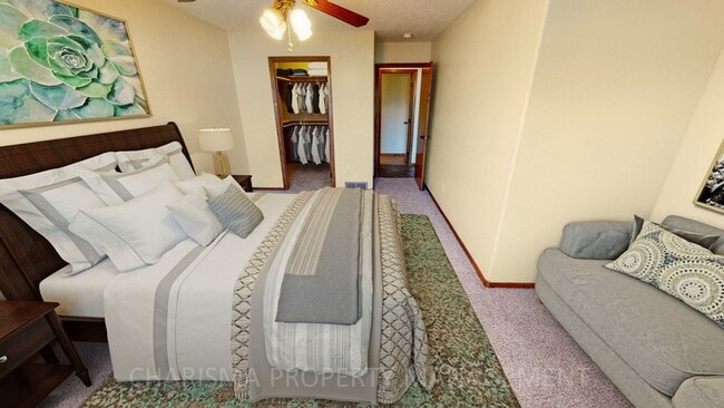 Building Photo - BEAUTIFUL 4 BD, 2 BA TOWNHOME WITH A FULLY EQUIPED KITCHEN, VAULTED CEILINGS, FIREPLACE, ATTACHED...