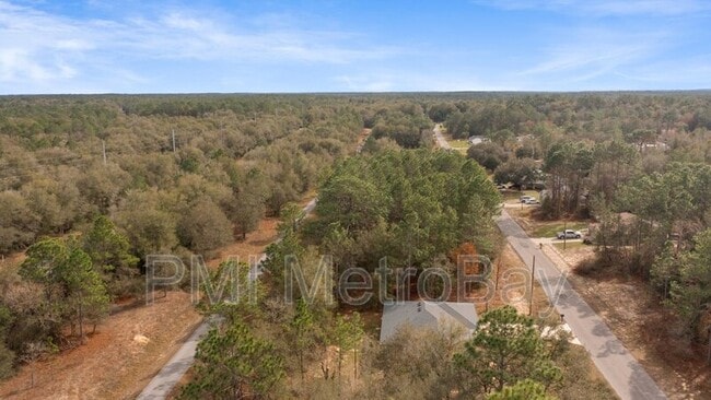 Building Photo - 9461 N Sandree Dr