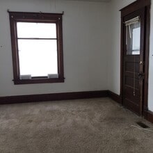 Building Photo - Corner lot with fenced yard!