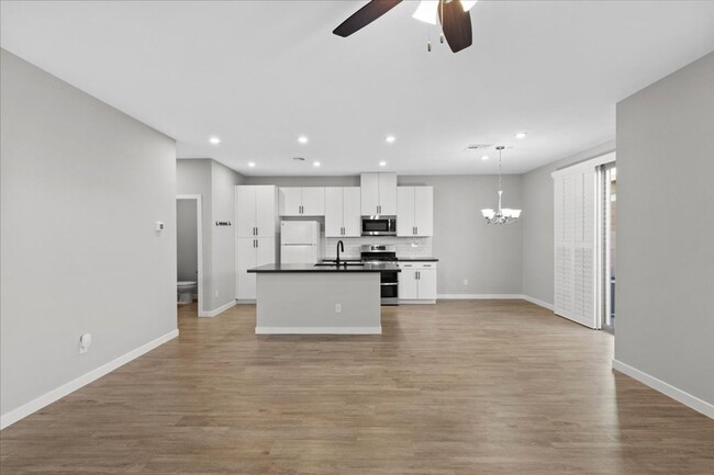 Building Photo - Beautiful and Highly Upgraded Townhome!