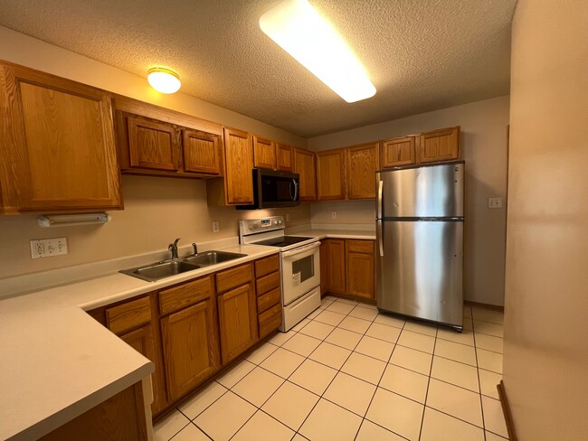 Building Photo - 6855 Woodland Ave