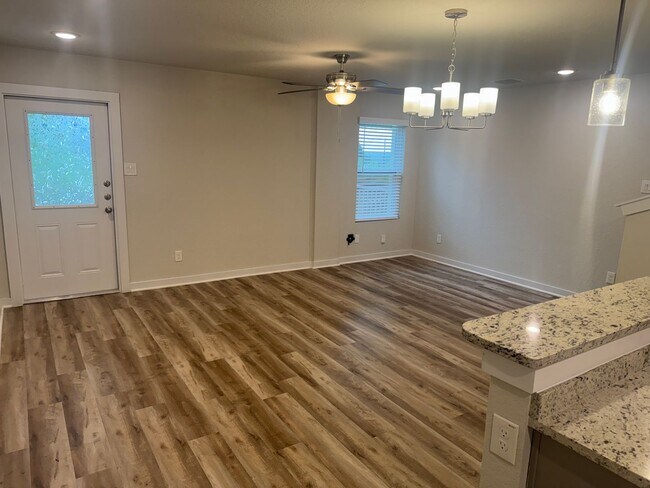 Building Photo - Stylish, Spacious & Close to It All – Your Ideal Townhome Awaits!