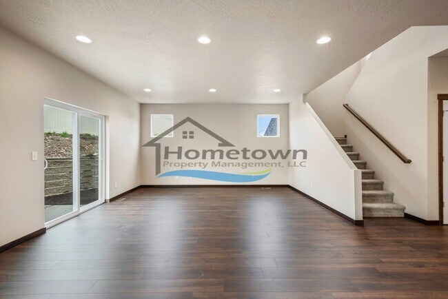 Building Photo - Woodbridge South Home with 4 Bedrooms and 3 Bathrooms in Post Falls build in 2021!