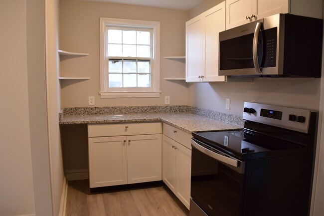 Building Photo - Charming Northside Two-Story Brick Home With 2 car garage and basement