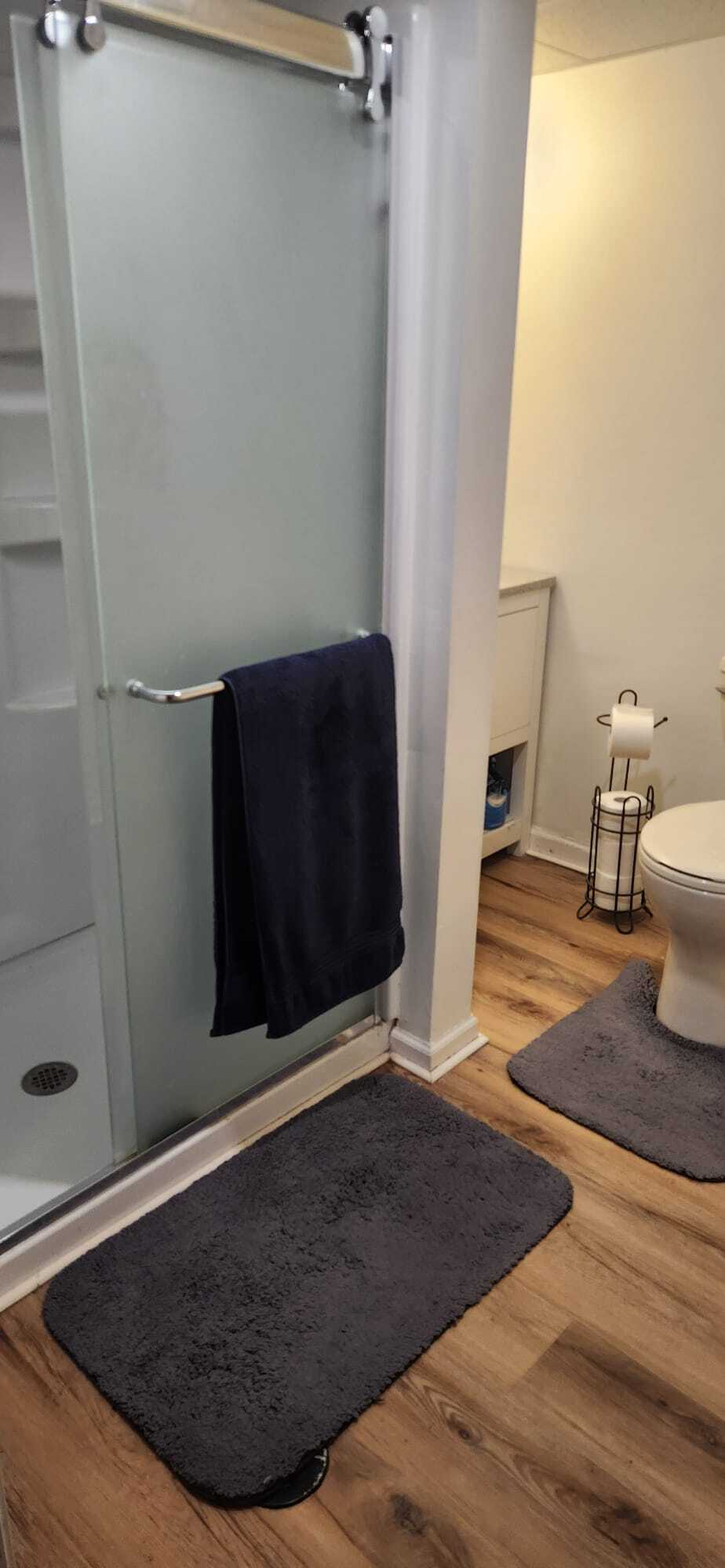 Downstairs bathroom floor - 2116 Thaler Ave