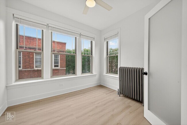 Building Photo - 6977 N Bell Ave