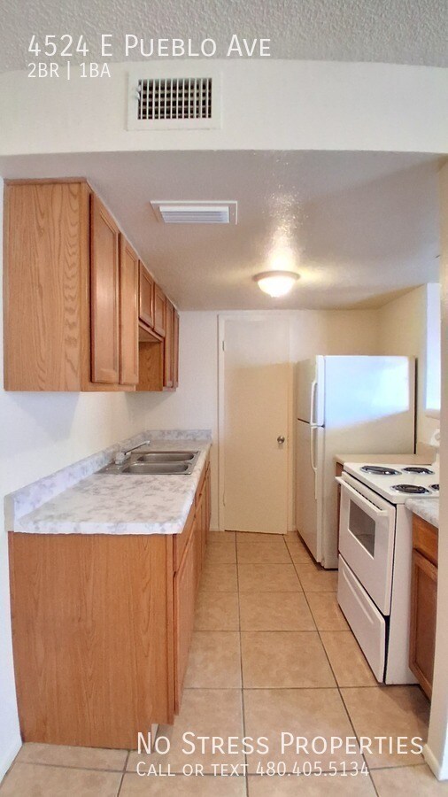 Building Photo - 4524 E Pueblo Ave