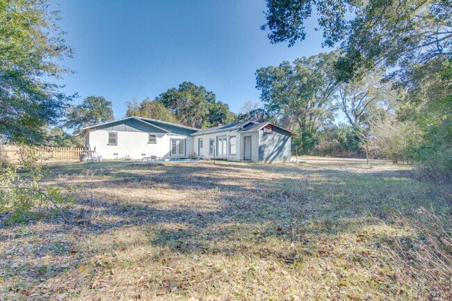 Building Photo - Stunning 4BR/2BA Pensacola Home with Private Pool, Modern Kitchen, Luxury Vinyl Flooring, Fully F...