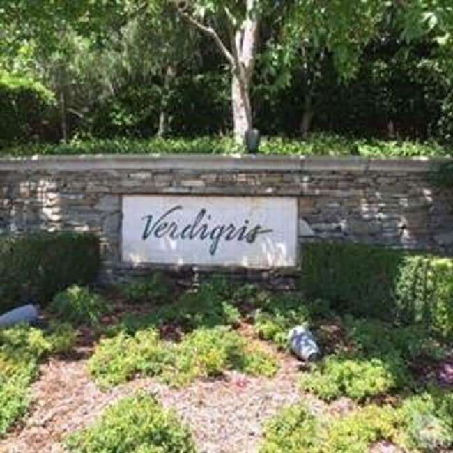 Building Photo - Located on a cul-de-sac, within the gated ...