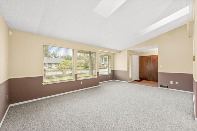 Building Photo - Charming Tacoma Home with A/C, RV Parking, Workshop & Skylit Living Room