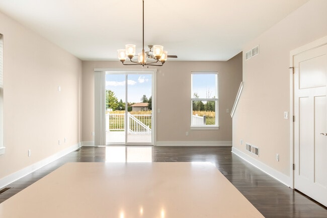 Building Photo - W218N16066 Tiger Lily Dr