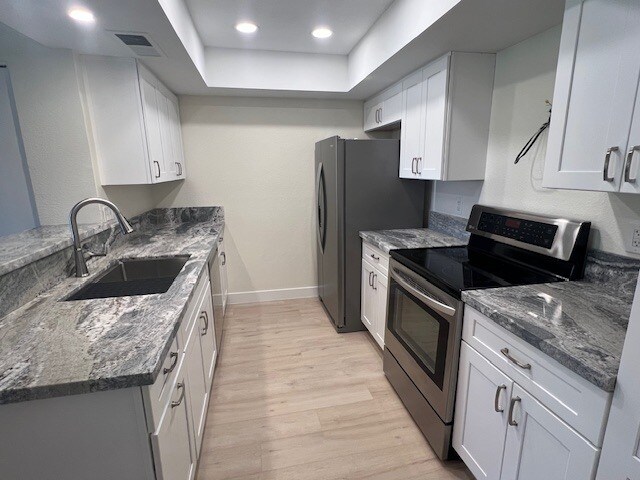 All new kitchen cabintes, countertops, and stainless steel appliances - 2146 W Isabella Ave
