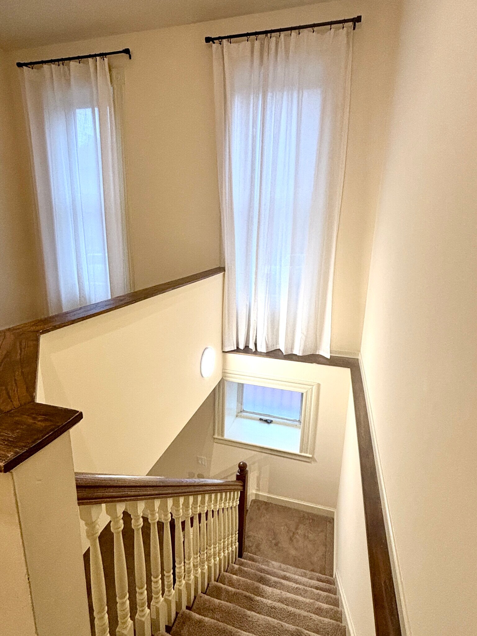 Top of stiarwell with privacy curtains - 2325 S 10th St