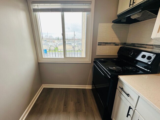 Building Photo - Experience Luxury Living at Bellagio Livin...