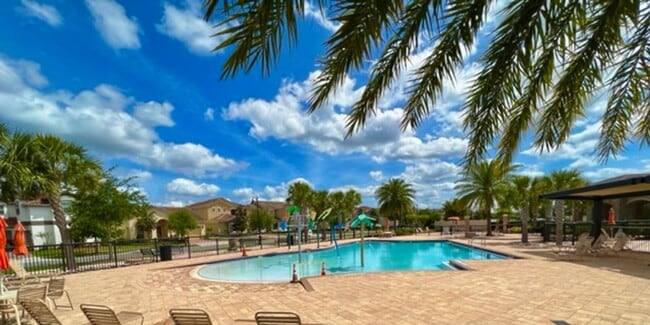 Building Photo - EAGLE CREEK LAKE NONA! WELCOME HOME! Beautiful water views! Spacious 2 story-3 bedroom 2.5 bath h...