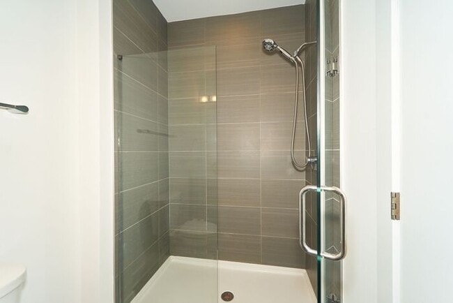 Building Photo - Like New Townhome With Your Own Rooftop Views of Downtown Indy!