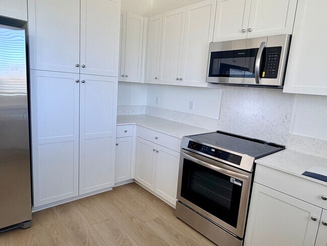 Building Photo - **Welcome to this beautifully designed 4-bedroom, 3-bathroom home offering modern living space.**