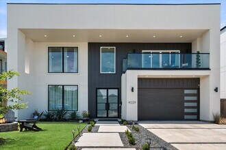 Building Photo - "Luxury 5-bedroom home offering expansive living, upscale design and seamless indoor-outdoor ente...