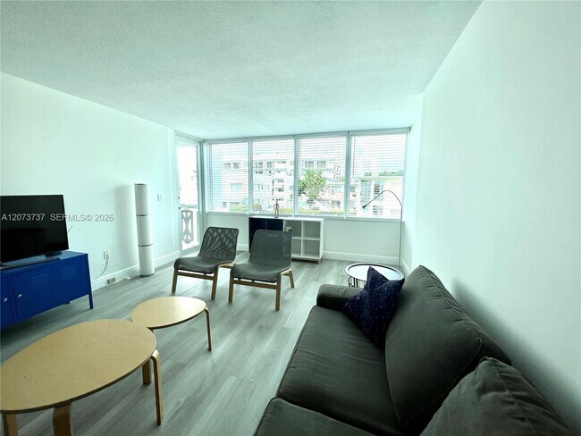 Building Photo - 8233 Harding Ave