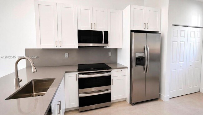 Building Photo - 6780 NW 186 Ter