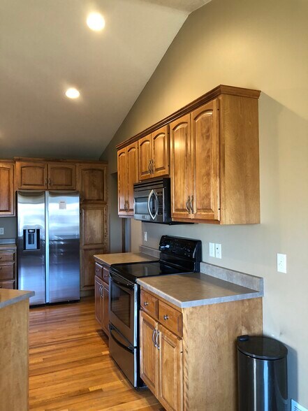 Open floor plan, will make you look forward to meal prep time! - 911 N Bahnson Ave
